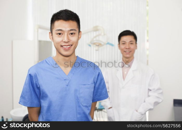 Portrait Of Smiling Dental Assistant in Clinic