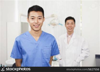 Portrait Of Smiling Dental Assistant in Clinic