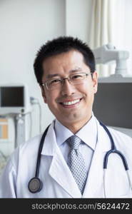 Portrait of smiling doctor with a stethoscope looking at camera