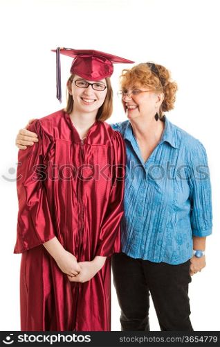 Portrait of smiling high school graduate and her proud mother. Vertical view over white.