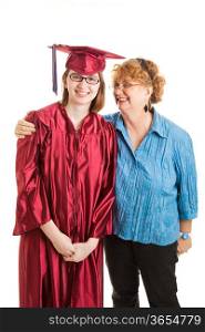 Portrait of smiling high school graduate and her proud mother. Vertical view over white.