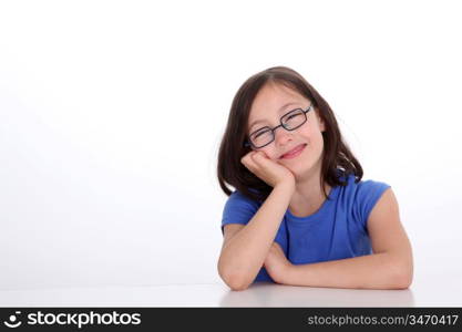 Portrait of smiling little girl with bue shirt