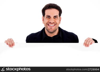 Portrait of smiling male holding blank white card