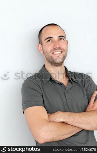 Portrait of smiling man with arms crossed