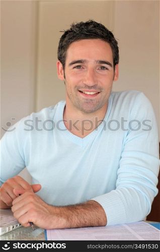 Portrait of smiling man working from home