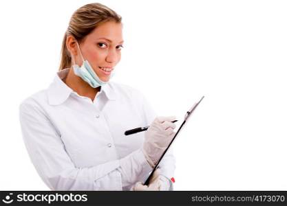 portrait of smiling medical professional with writing pad on an isolated background