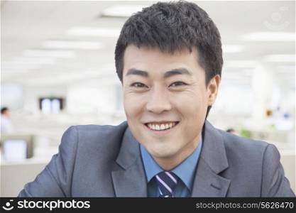 Portrait of Smiling Mid Adult Businessman