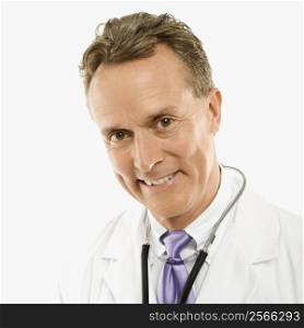 Portrait of smiling mid-adult Caucasian male doctor with stethoscope around his neck.