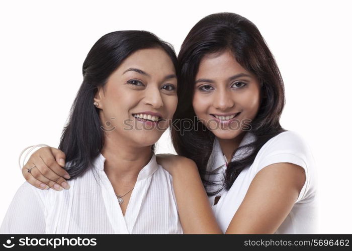 Portrait of smiling mother and daughter