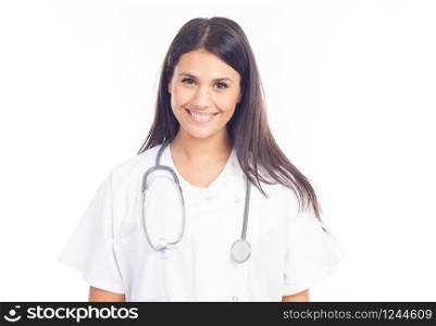 portrait of smiling nurse or brunette doctor in white coat with stethoscope