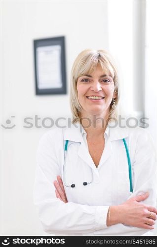Portrait of smiling senior doctor