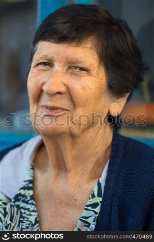 portrait of smiling senior woman close-up