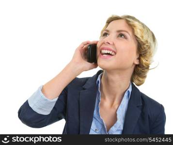 Portrait of smiling teenage girl talking mobile phone