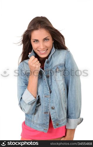 Portrait of smiling teenager on white background