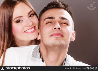 Portrait of smiling woman and man. Happy couple.. Portrait of smiling woman and man posing. Happy joyful couple. Good relationship.