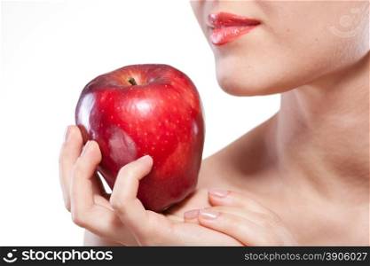 Portrait of smiling woman holding red apple isolated on white