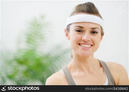 Portrait of smiling woman in sportswear