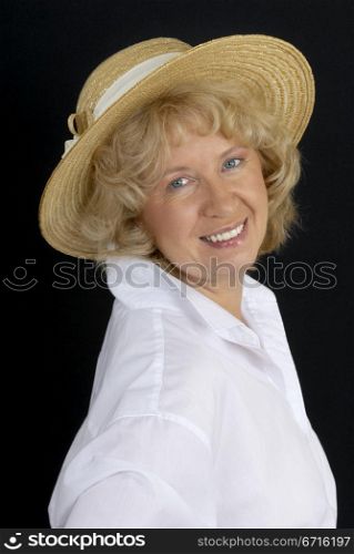 Portrait of smiling woman in white man?s shirt