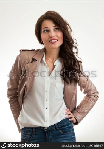 Portrait of smiling woman wearing casual clothes. Positive and full of energy