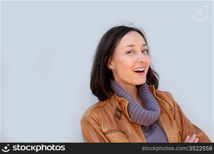 Portrait of smiling woman with turtleneck sweater