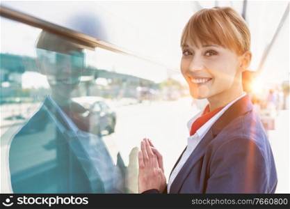 Portrait of smiling young attractive flight attendant in airport