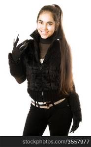 Portrait of smiling young brunette in gloves with claws