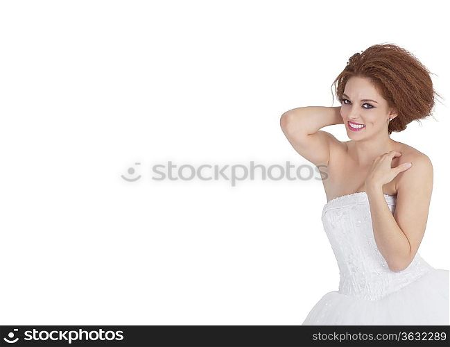 Portrait of smiling young brunette posing over white background