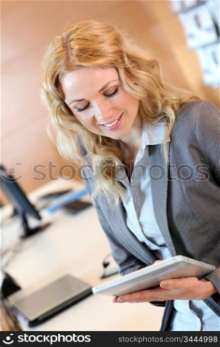 Portrait of smiling young businesswoman in office