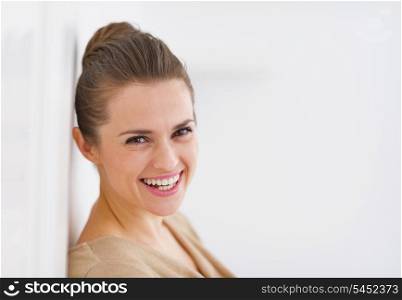 Portrait of smiling young housewife