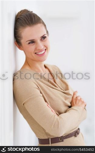 Portrait of smiling young housewife