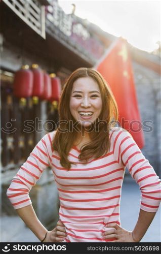 Portrait Of Smiling Young Woman In Houhai, Beijing