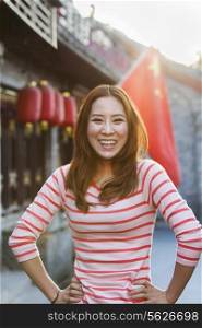 Portrait Of Smiling Young Woman In Houhai, Beijing