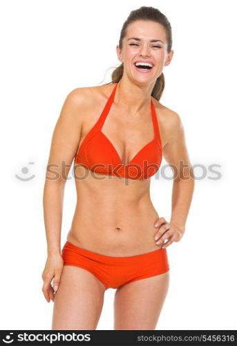 Portrait of smiling young woman in swimsuit