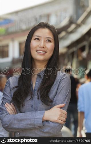 Portrait of smiling young women outdoors, Beijing