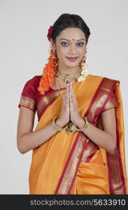 Portrait of South Indian woman greeting