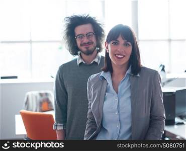 Portrait of startup business couple in a modern office