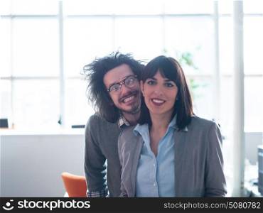 Portrait of startup business couple in a modern office