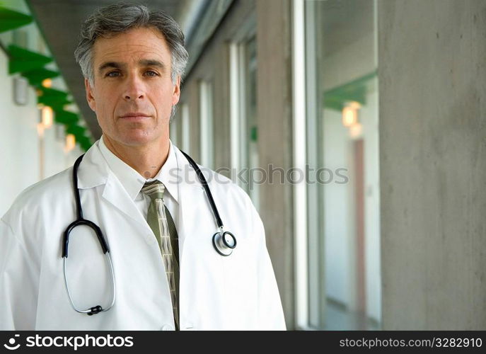 Portrait of stern looking doctor.