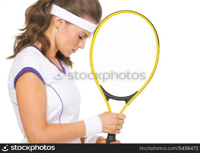 Portrait of stressed female tennis player