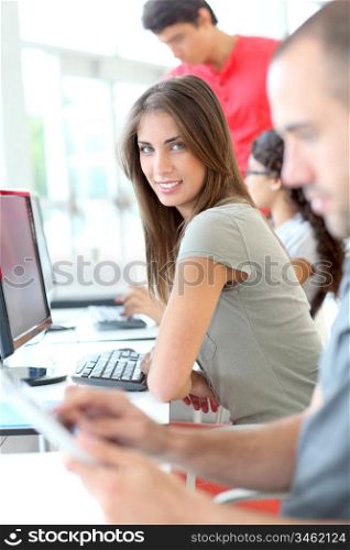 Portrait of student girl in computing class