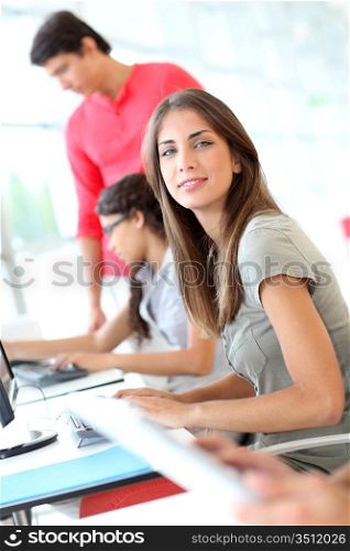 Portrait of student girl in computing class