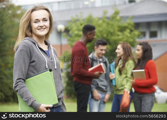 Portrait Of Student Group Outside College Building