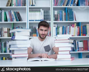 portrait of student in collage school library, arab youth learning and reading book