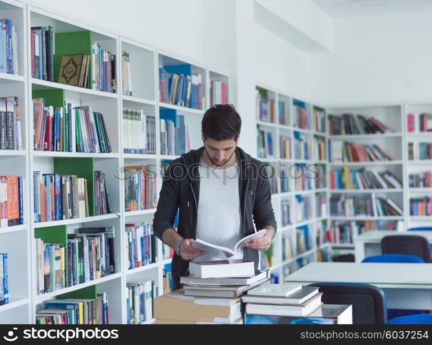 portrait of student in collage school library, arab youth learning and reading book