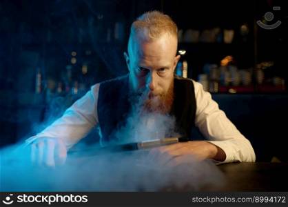 Portrait of stylish bearded man exhales smoke while smoking hookah. Fashion guy sitting at table and blowing steam vortexes. Portrait of stylish bearded man exhales smoke while smoking hookah