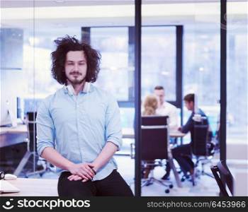 Portrait Of Successful Businessman Entrepreneur At Busy startup Office