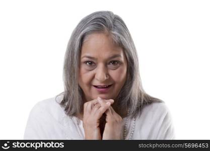 Portrait of surprised mature woman over white background