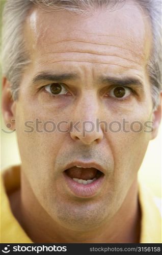 Portrait Of Surprised Middle Aged Man