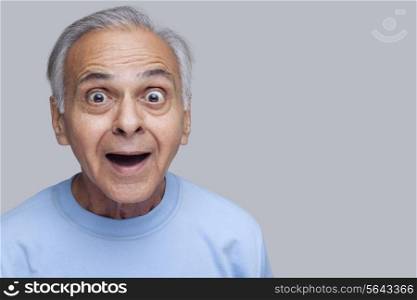 Portrait of surprised senior man