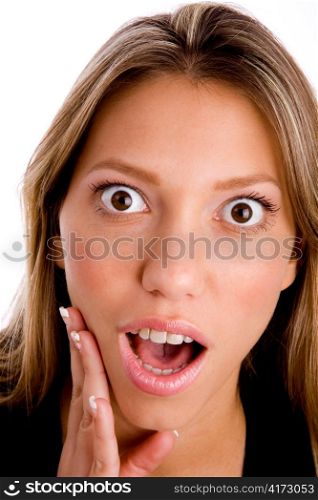 portrait of surprised young woman against white background